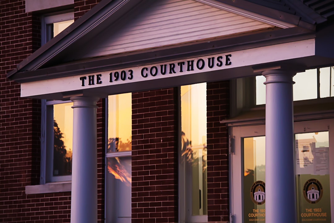 The 1903 courthouse is shown at sunset.